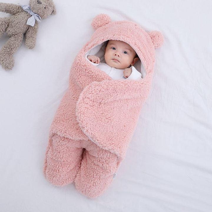 Baby in a teddy fleece sleeping bag