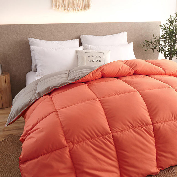 Quilted winter duvet on a bed