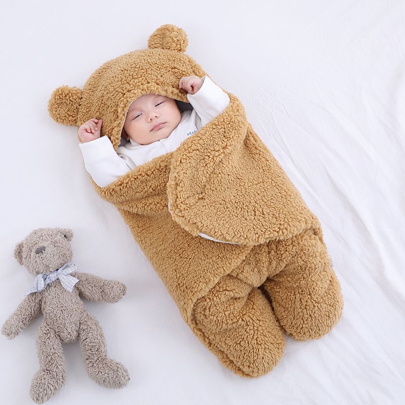 Baby in a teddy fleece sleeping bag