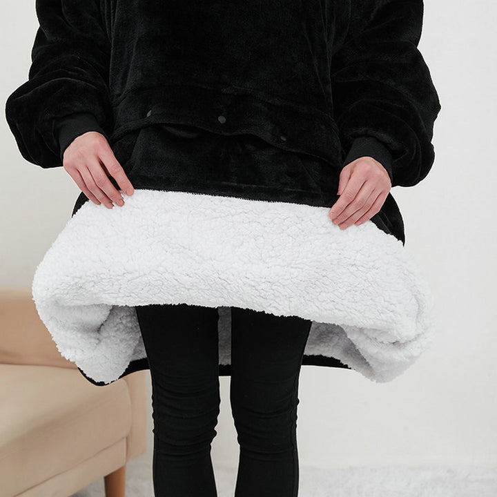 Person in a heated hoodie blanket